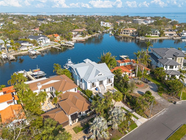 aerial view with a water view and a residential view