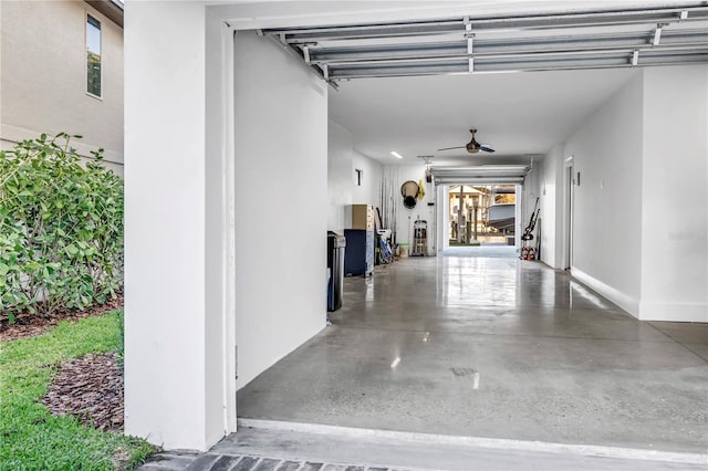 garage featuring a ceiling fan