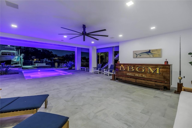view of pool featuring a ceiling fan