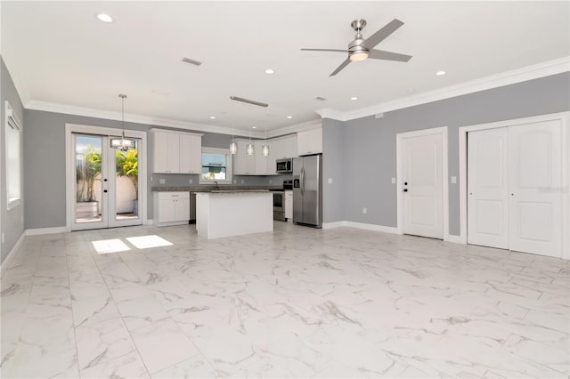 unfurnished living room with baseboards, a ceiling fan, crown molding, and recessed lighting