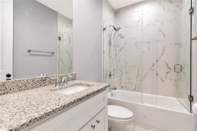 bathroom featuring bath / shower combo with glass door, vanity, toilet, and marble finish floor