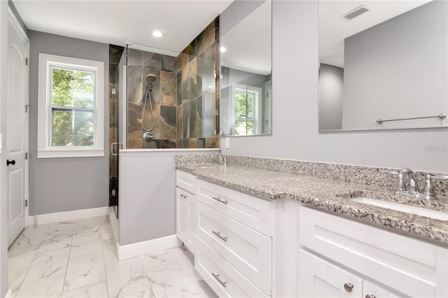 full bath with double vanity, visible vents, a stall shower, a sink, and recessed lighting