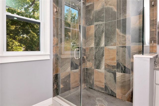 bathroom with a stall shower