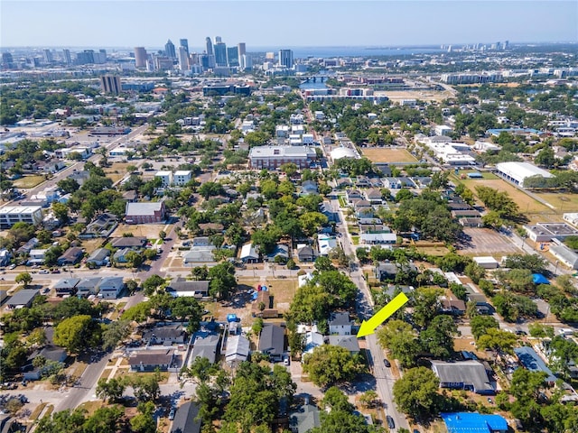 birds eye view of property with a view of city