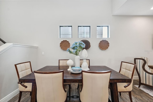 17537 Brighton Lake Rd, Land O Lakes, FL 34638 - dining space with dark wood-type flooring and baseboards