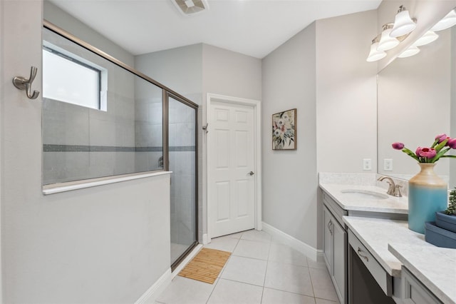 17537 Brighton Lake Rd, Land O Lakes, FL 34638 - full bathroom featuring baseboards, a shower stall, tile patterned flooring, and vanity