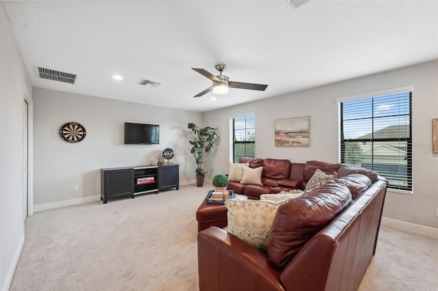 17537 Brighton Lake Rd, Land O Lakes, FL 34638 - living area with a ceiling fan, visible vents, baseboards, light carpet, and recessed lighting