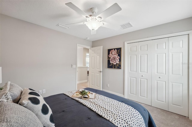 17537 Brighton Lake Rd, Land O Lakes, FL 34638 - bedroom with ceiling fan, visible vents, light carpet, and a closet