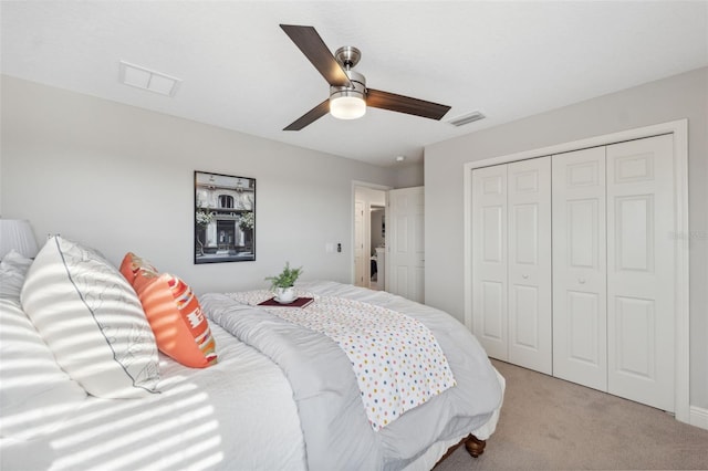 17537 Brighton Lake Rd, Land O Lakes, FL 34638 - bedroom featuring light colored carpet, a ceiling fan, visible vents, and a closet
