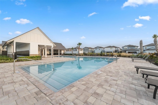 17537 Brighton Lake Rd, Land O Lakes, FL 34638 - pool with fence, a patio, and a residential view