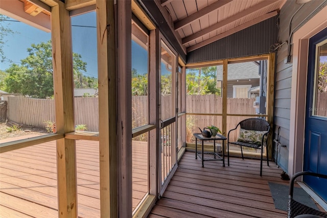 sunroom / solarium with beamed ceiling