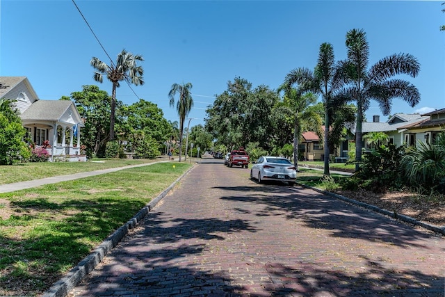 view of road featuring curbs and sidewalks