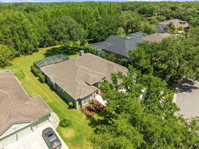 drone / aerial view with a forest view