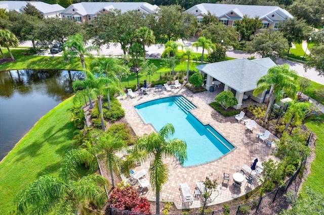 26514 Chimney Spire Ln, Wesley Chapel, FL 33544 - community pool with fence, a patio, and a water view