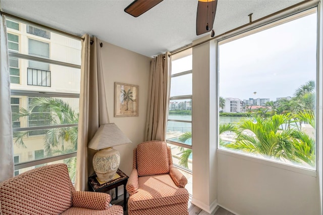 7400 Sun Island Dr S Unit 206, South Pasadena, FL 33707 - sunroom / solarium featuring healthy amount of natural light and a water view