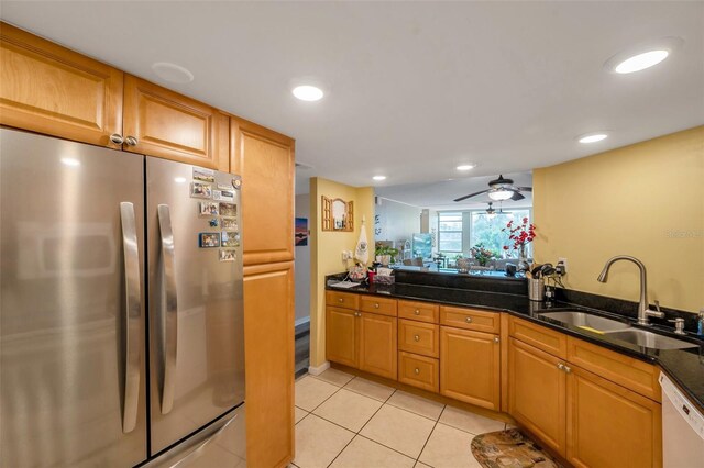7400 Sun Island Dr S Unit 206, South Pasadena, FL 33707 - kitchen featuring freestanding refrigerator, a sink, white dishwasher, light tile patterned flooring, and recessed lighting