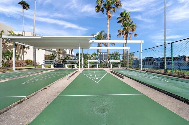 7400 Sun Island Dr S Unit 206, South Pasadena, FL 33707 - view of property's community featuring fence and shuffleboard