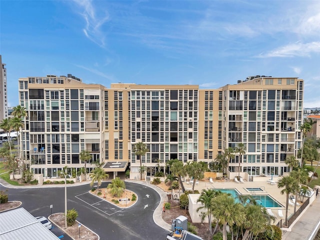7400 Sun Island Dr S Unit 206, South Pasadena, FL 33707 - view of apartment building / complex featuring a community pool