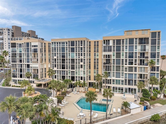 7400 Sun Island Dr S Unit 206, South Pasadena, FL 33707 - community pool featuring a patio area