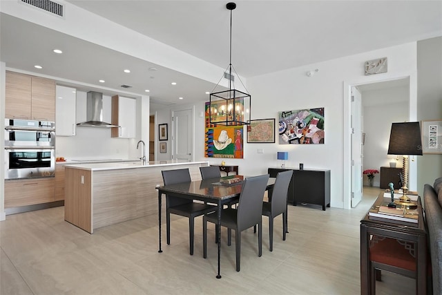 301 1st St S Unit 2305, Saint Petersburg, FL 33701 - dining area featuring recessed lighting, visible vents, and a chandelier