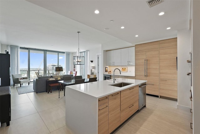 301 1st St S Unit 2305, Saint Petersburg, FL 33701 - kitchen featuring a sink, visible vents, light countertops, dishwasher, and modern cabinets