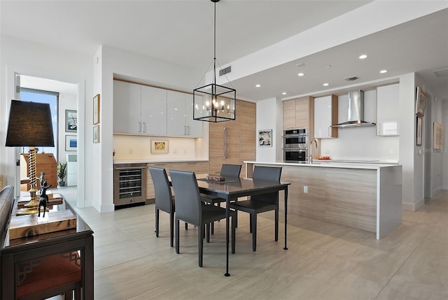 301 1st St S Unit 2305, Saint Petersburg, FL 33701 - dining room featuring bar area, recessed lighting, a chandelier, visible vents, and wine cooler