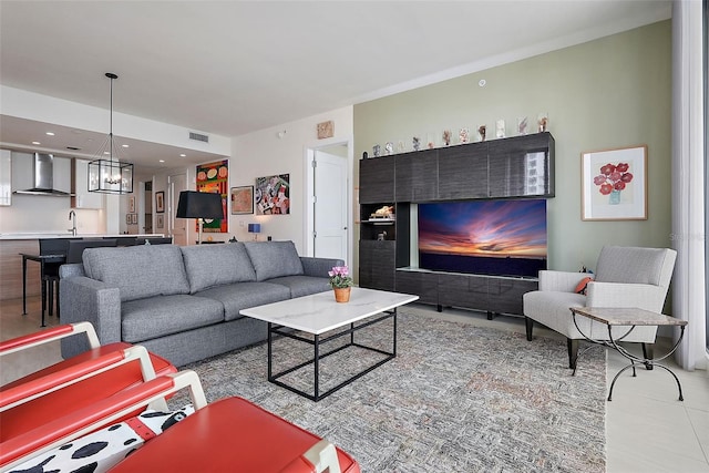 301 1st St S Unit 2305, Saint Petersburg, FL 33701 - living area featuring visible vents and a notable chandelier