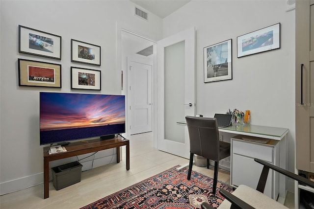 301 1st St S Unit 2305, Saint Petersburg, FL 33701 - office area with baseboards and visible vents