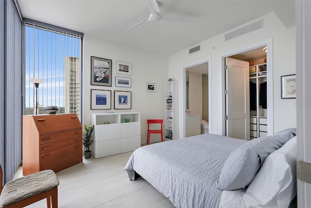 301 1st St S Unit 2305, Saint Petersburg, FL 33701 - bedroom with light tile patterned floors, a ceiling fan, and visible vents