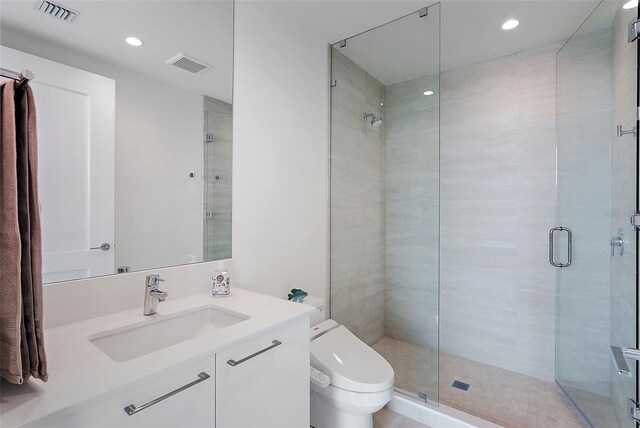 301 1st St S Unit 2305, Saint Petersburg, FL 33701 - full bathroom featuring toilet, visible vents, and a shower stall