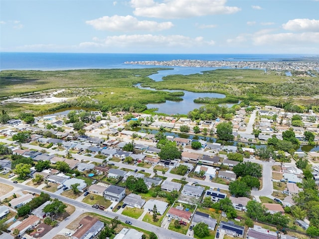 aerial view featuring a water view and a residential view