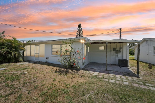 view of front of house with a yard