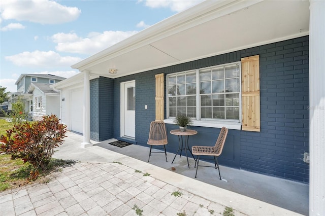 view of patio with a garage