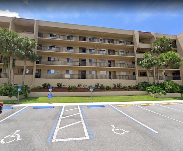 90 S Highland Ave Unit 1217, Tarpon Springs, FL 34689 - view of property with uncovered parking