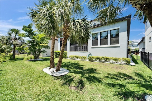 view of yard with a fenced backyard
