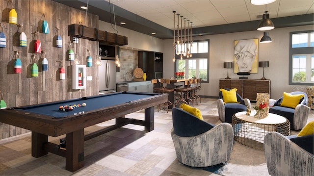 rec room with an inviting chandelier and pool table