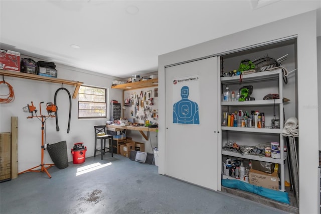 garage with a workshop area