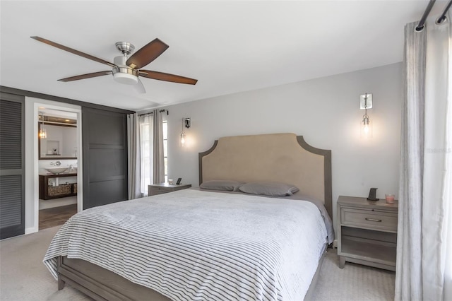 carpeted bedroom featuring ceiling fan