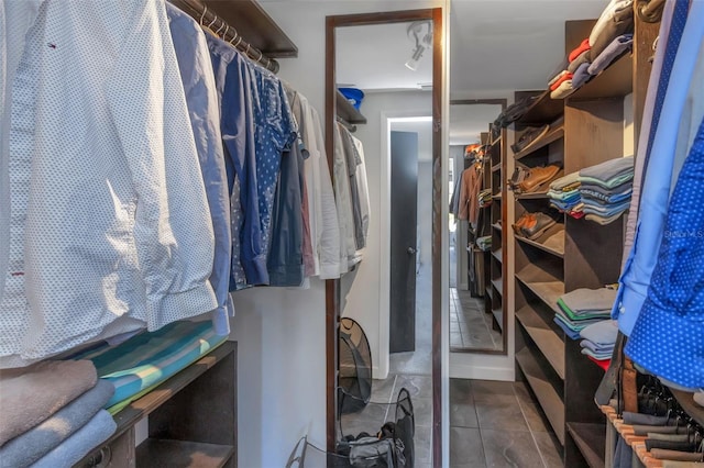 spacious closet with tile patterned flooring