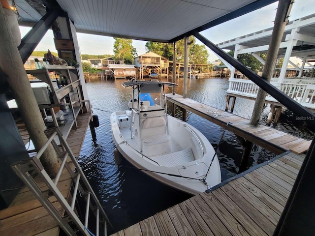 dock area featuring a water view