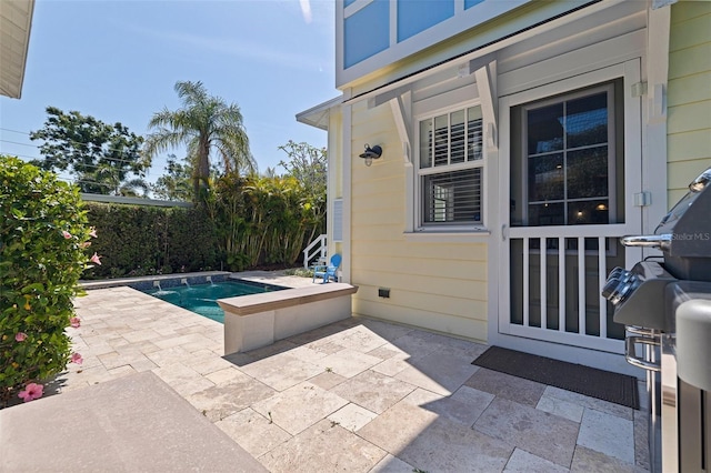 view of swimming pool featuring a patio area and a fenced in pool