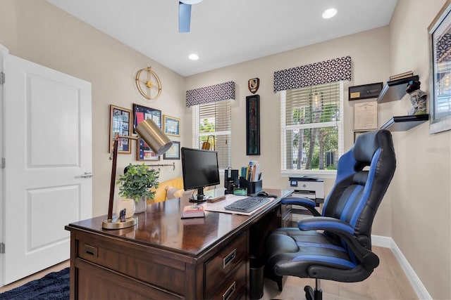 office with recessed lighting and baseboards