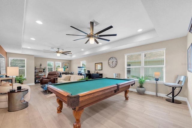 rec room featuring light wood finished floors, recessed lighting, pool table, and a tray ceiling