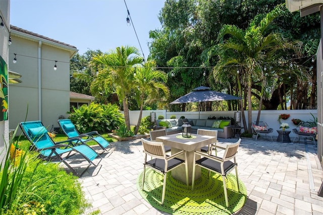 view of patio / terrace with an outdoor hangout area and a fenced backyard