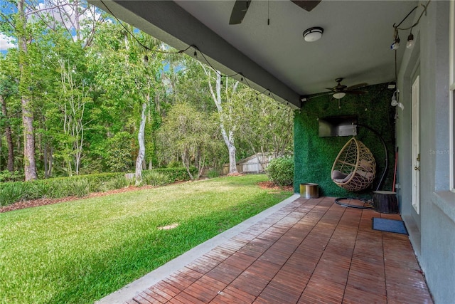 view of patio featuring ceiling fan and a fenced backyard