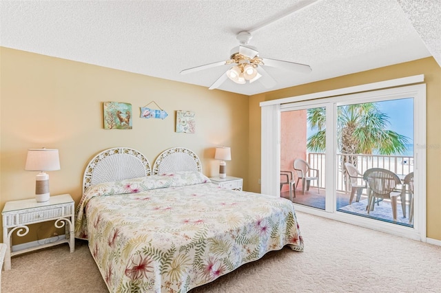 18400 Gulf Blvd Unit 1109, Indian Shores, FL 33785 - bedroom featuring carpet floors, access to outside, a textured ceiling, ceiling fan, and baseboards