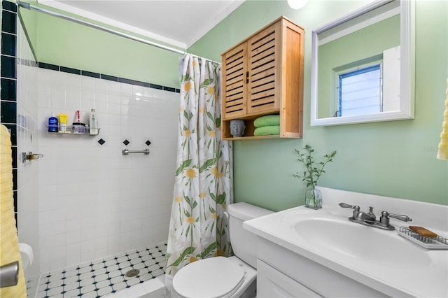 full bathroom with toilet, a tile shower, and vanity