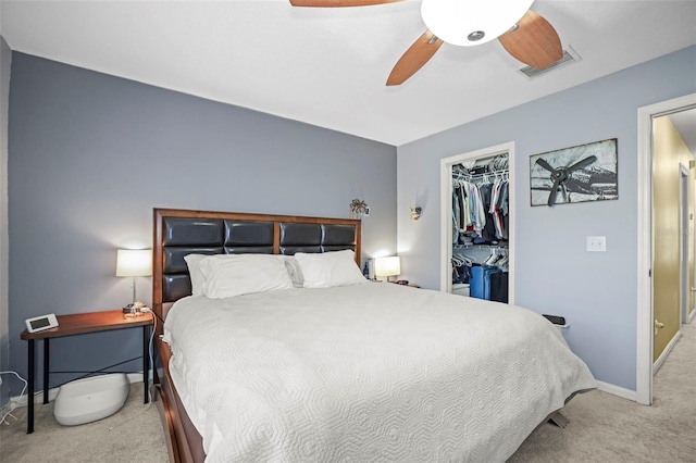 bedroom featuring carpet floors, visible vents, a closet, baseboards, and a ceiling fan