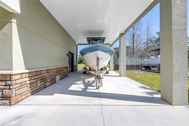 592 Ken Hubbard Rd, Terra Ceia, FL 34250 - view of patio / terrace featuring concrete driveway