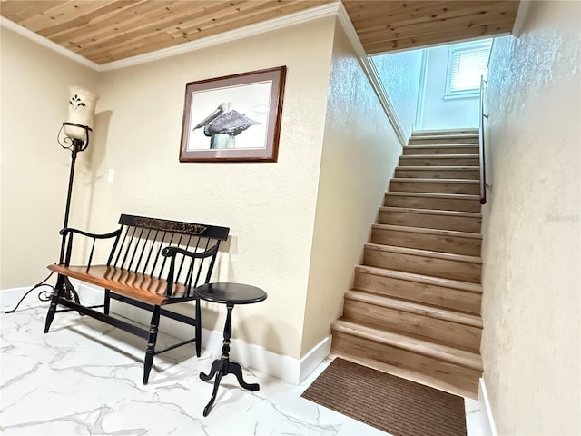 592 Ken Hubbard Rd, Terra Ceia, FL 34250 - stairs featuring marble finish floors, wood ceiling, ornamental molding, and baseboards
